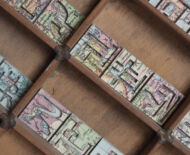 Artwork: Betabet (detail), 2014 by artist Emma Lloyd, Sculpted atlas and compositor's case