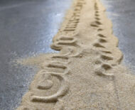 Artwork: Passage (detail) 2019 by artist Emma Lloyd, stencilled sand