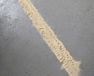 Artwork: Passage 2019 by artist Emma Lloyd, stencilled sand