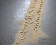 Artwork: Passage (detail) 2019 by artist Emma Lloyd, stencilled sand